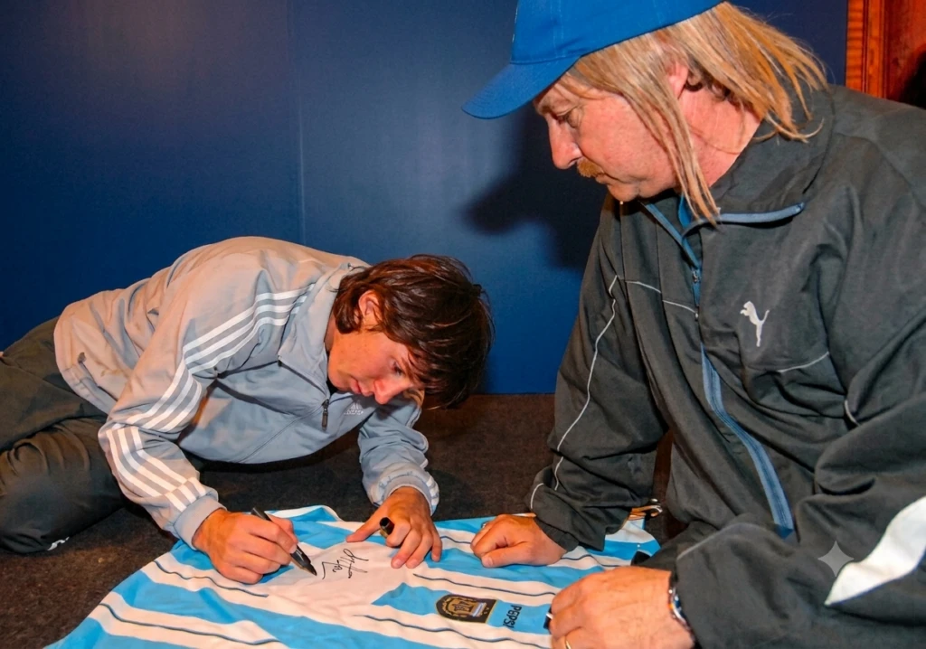 Lionel Messi y Eber Ludueña