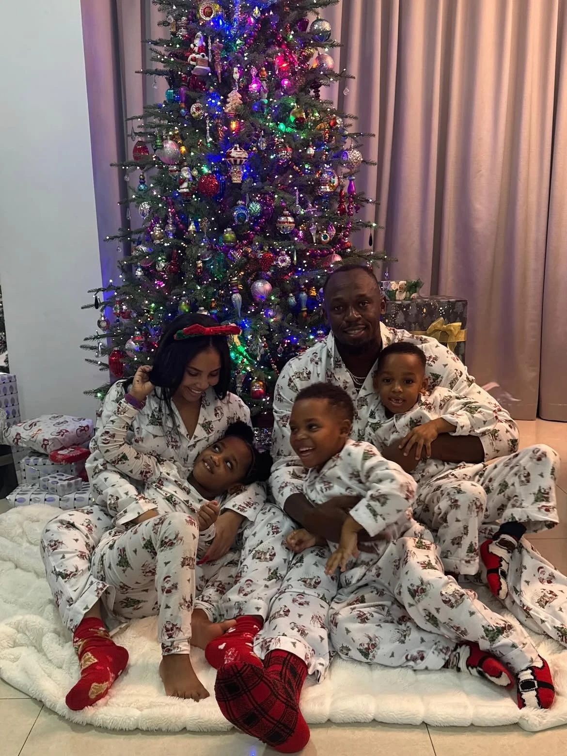 Usain Bolt y familia